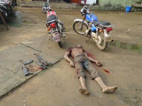 BODY OF THE DEAD KIDNAPPER, TWO MOTORCYCLES, TWO AK47 AND TWO MOBILE PHONES RECOVERED DURING THE POLICE RAID