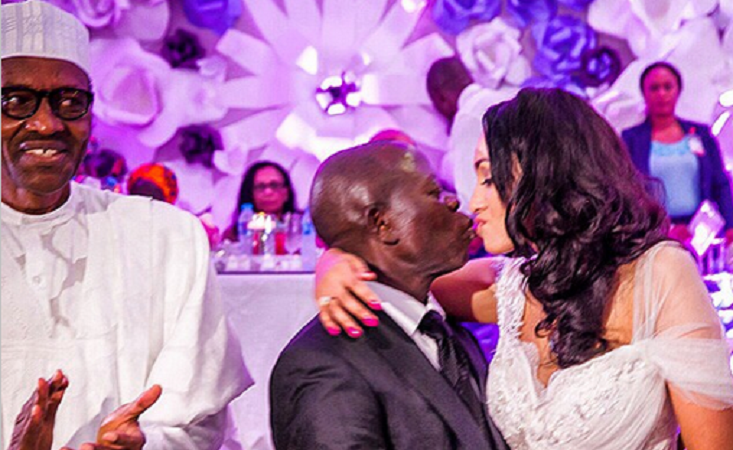 Oshiomole kissing his new wife - President Buhari clapping