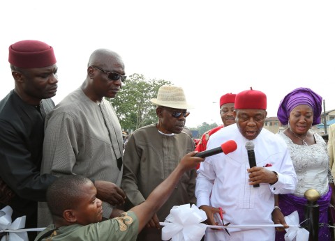Gov. Theodore Orji of Abia state cutting the tape to commission the renovated ultra modern Okpara square in Umuahia. with him from L-R are Rt. Hon. Ude Okochukwu, speaker state house of assembly, Ndubisi Mbaka M/D Trademore Investments, Sir Emeka Ananaba, deputy governor and Lady Mercy Orji, wife of the governor.