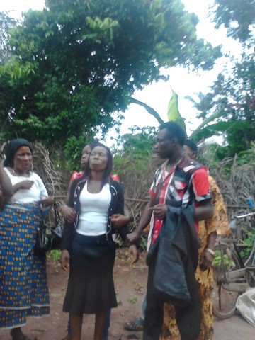 Mother of the stolen baby being consoled by relatives