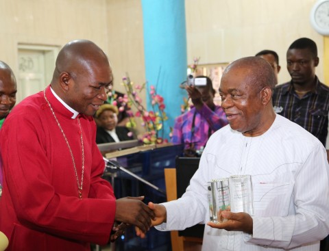 Abia state Governor, Theodore Orji being honored with the prestigious John Calvin award by Rev. Ibeabuchi Agwu, Moderator, South Central Synod  on behalf of the church during the opening ceremony of the 18th Annual Synod at St. Peter’s Presbyterian Church of Nigeria Umuahia