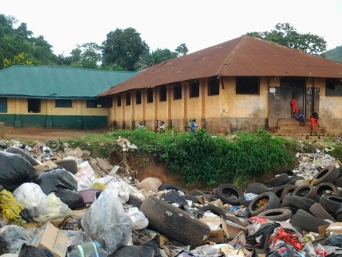 Ancient and mordern St. Peter's primary school, Ogbete, coal camp Enugu taken over by heaps of refuse