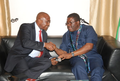 His Excellency, Deputy Governor Of Imo State, Prince Eze Madumere In A Warm Handshake With The Reg. Manager Of Zenith Bank, Dr. Austin Njoko When The Latter Paid A Visit The Deputy Governor