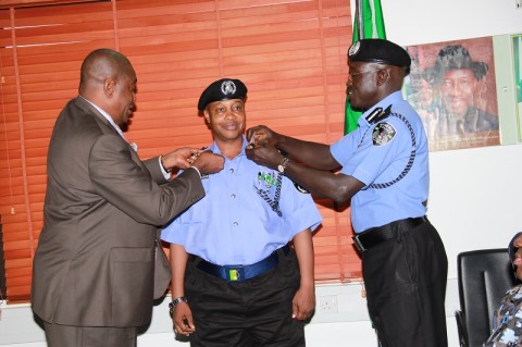 CP Alkali Baba Usman being decorated with his new rank by the IGP