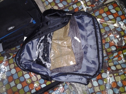 the small bag showing the parcel of cocaine