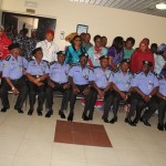 Newly promoted Officers in a group photograph with IGP & family members
