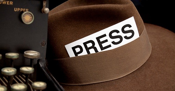 Newspaper Reporter's Press Pass in Hat, White Background.