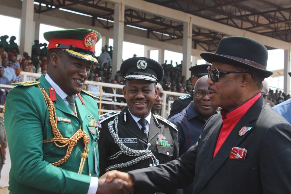 Chief Willie Obiano, Governor of Anambra State being welcomed to the event marking the Armed Forces Remembrance Day by Hosea Karma, Commissioner of Police and Col Issah. M. Abdullahi, Commander 302 Artillery Regiment Nigerian Army, Onitsha...Friday