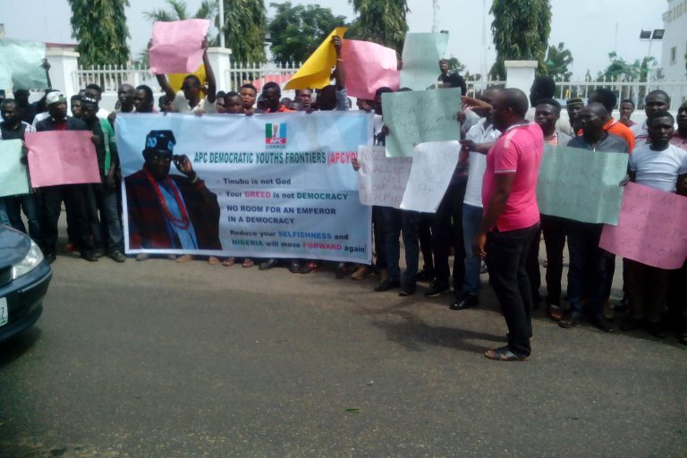 Tinubu is Not God, APC Youths Group Protest, shuts National Secretariat