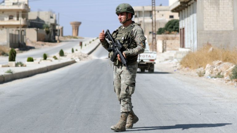 Russian troops patrol Syrian border following deal with Turkey