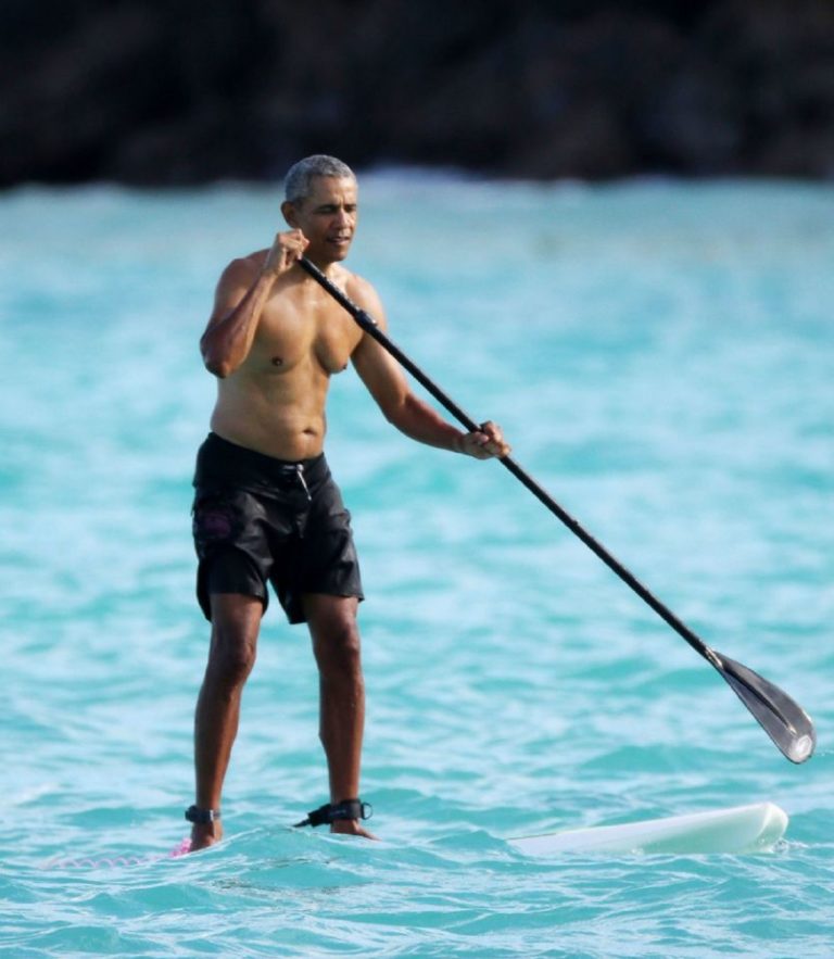 Barack Obama Takes Shirtless Paddle Board Ride During Hawaii Vacation