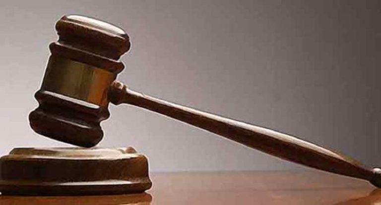 Woman, 40, docked for allegedly refusing to pay back Church loan