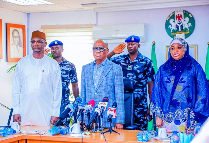 From L-R Gov Abdullahi Sule of Nasarawa State; Minister of FCT, Mr Nyesom Wike and Minister of State for FCT, Dr Mariya Mahmoud, during a visit by the Nasarawa governor on Friday