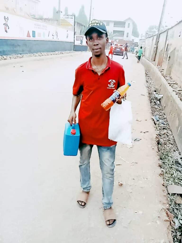 Meet Young Graduate and Mathematician Who Hawks Palm Oil As Means of Livelihood in Anambra