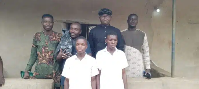 Commissioner For Works, Engr. Lebechi Mbam, scholarship beneficiaries and the school principal