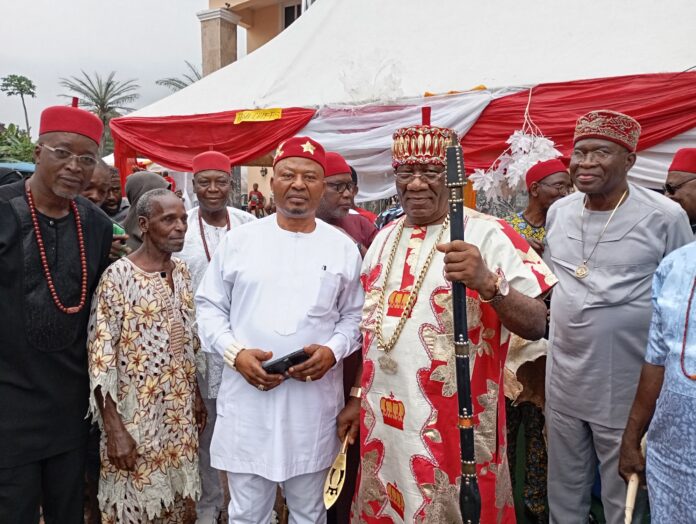 His Majesty, Igwe Pharm Alex Uzo Onyido of Ogidi community, Ezechuamuagha (center) flanked by Former Rector Federal Polytechnic Oko, Dr Uche Onyegbu and other dignitaries during the New Yam festival