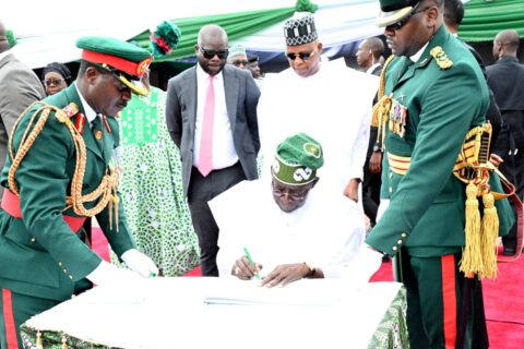  President Bola Ahmed Tinubu signing the Independence Anniversary register at the Independence Day Parade, held at the forecourt of the State House, Abuja, on October 1, 2024