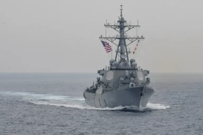 Iranian helicopter confronts US warship approaching territorial waters