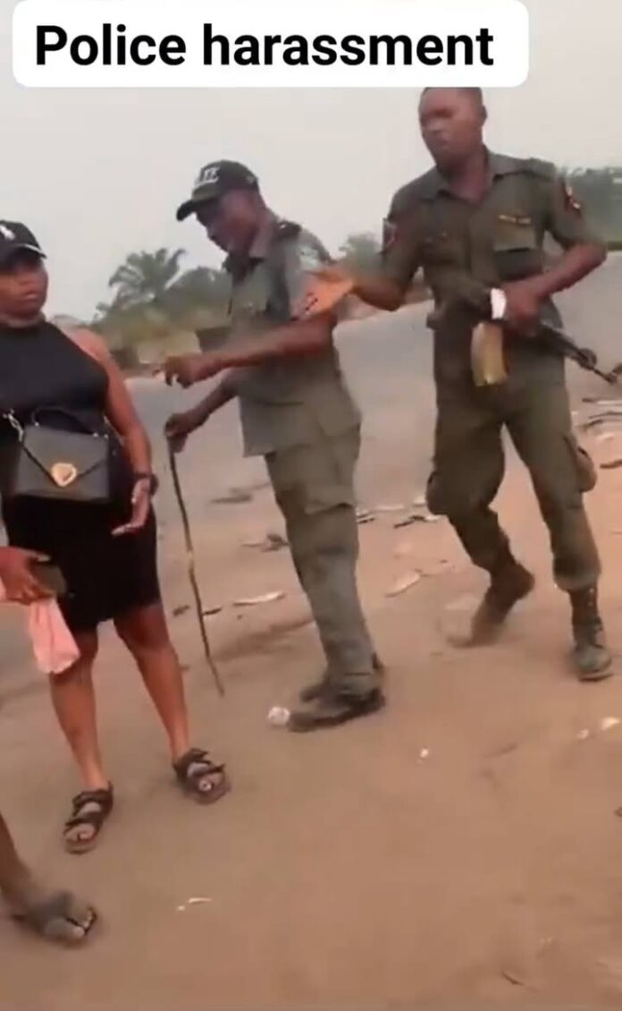 Outrage As Video Captures Police Officer Cocking Gun And Calling Woman 
