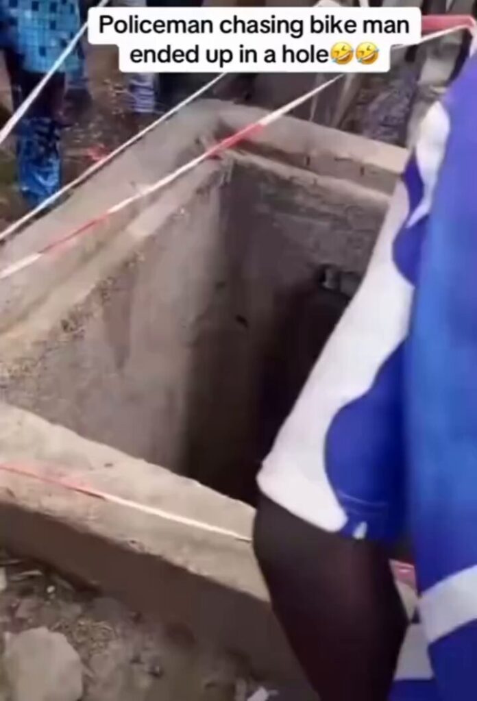 Crowd Mocks Policeman Who Plunged Into Trench While Chasing Okada Rider for Extortion