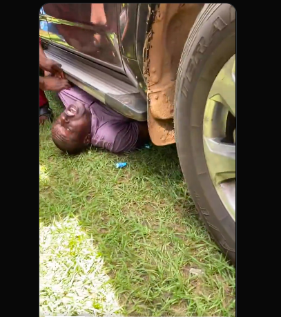 Drama in Peter Obi's Convoy as Enthusiastic Supporter Crawls Under Vehicle Demand Meeting